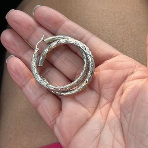 Sterling silver earrings 1.5inches long.